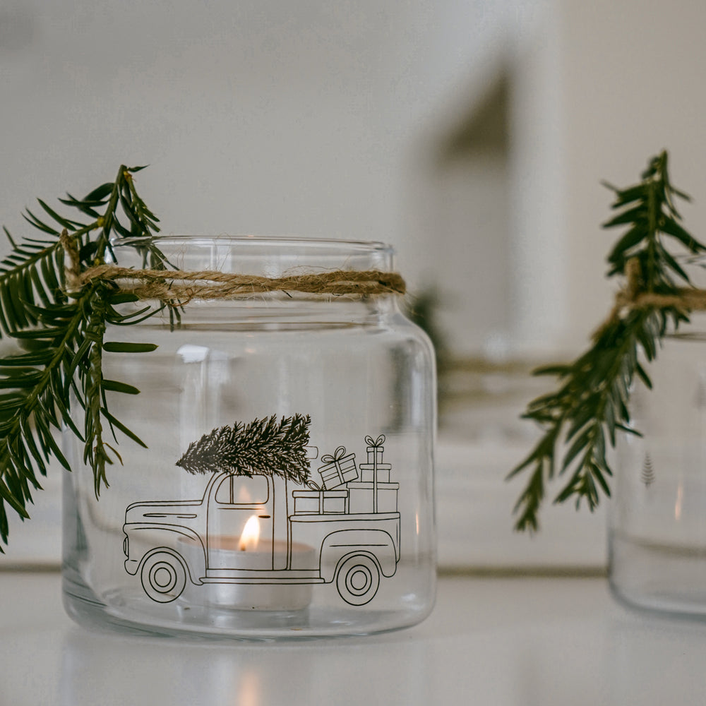 Vase moyen en verre d'une voiture de Noël