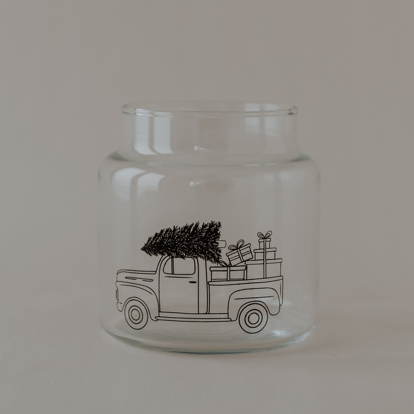Vase moyen en verre d'une voiture de Noël