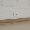 Detail Wandkalender mit Logo und feiner Typografie