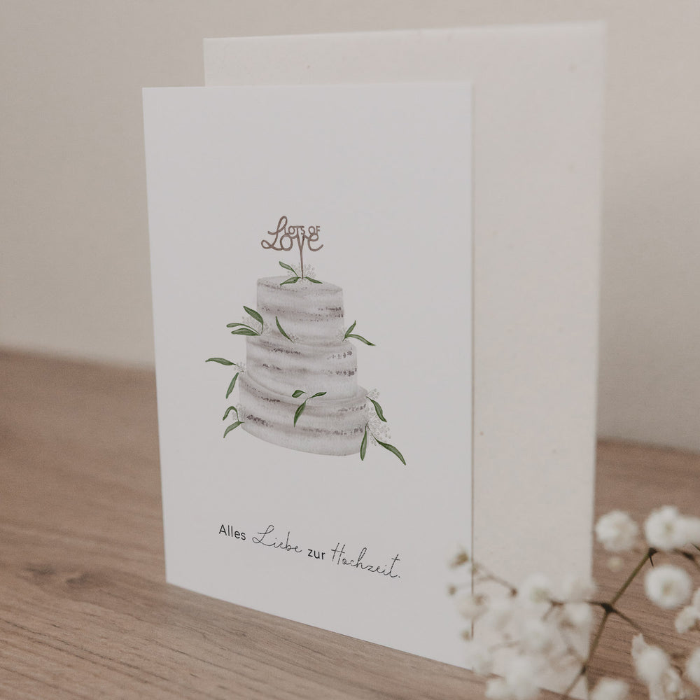 Klappkarte mit Illustration einer dreistöckigen Hochzeitstorte und Schriftzug 'Alles Liebe zur Hochzeit' auf hellem Hintergrund