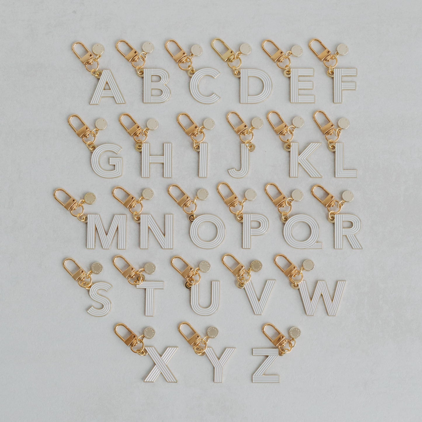 ABC Schlüsselanhänger hellgrau