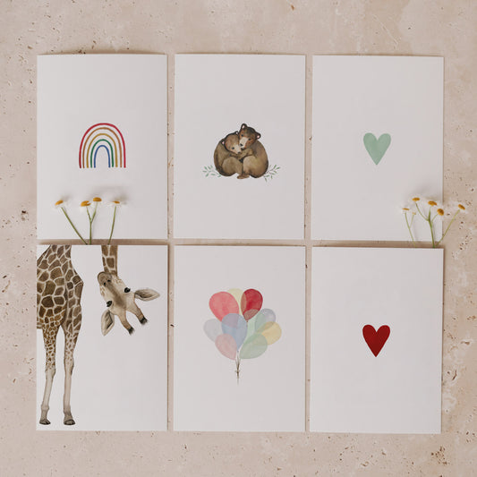 Aquarellkarten Set Kids mit sechs liebevollen Motiven: Regenbogen, Bären, Herzen, Giraffe und Luftballons.