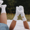 Kids Socken mit Smiley von Eulenschnitt beim Spielen im Freien