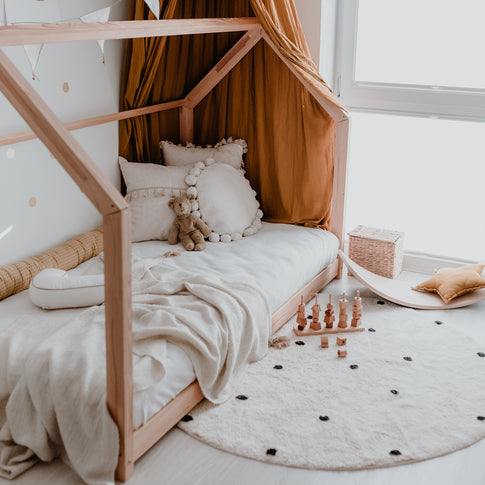 Tapis tissée rond à pois 