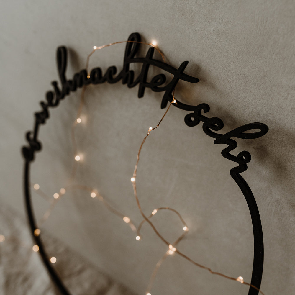 Couronne en bois Es weihnachtet sehr